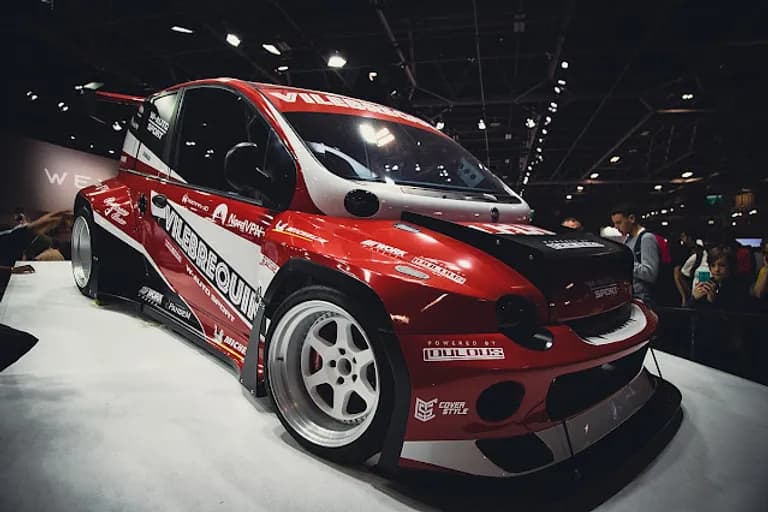  racer race car racing car sports car sport car car wheel pickup pickup truck-0