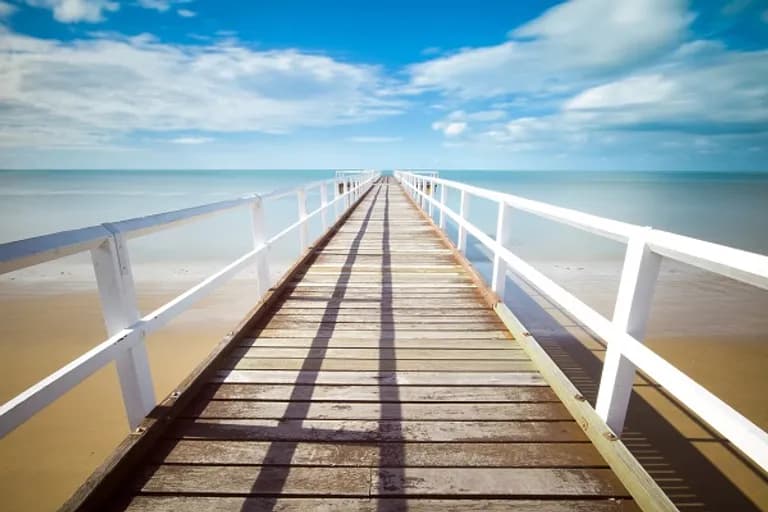  pier seashore coast seacoast sea-coast bannister banister balustrade balusters handrail sandbar sand bar-0