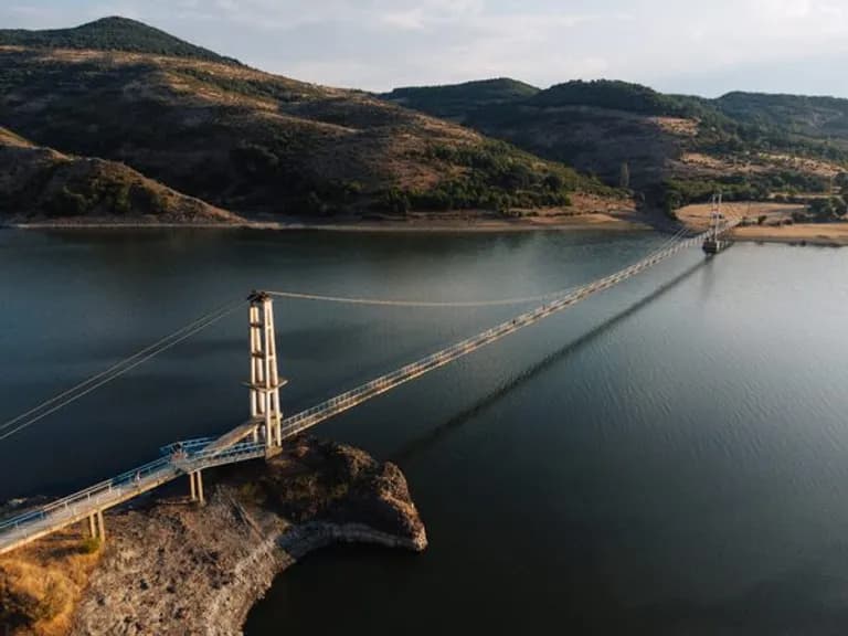  suspension bridge promontory headland head foreland pier dam dike dyke-0